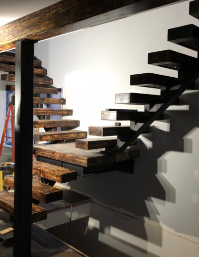 A staircase is being built in a room.