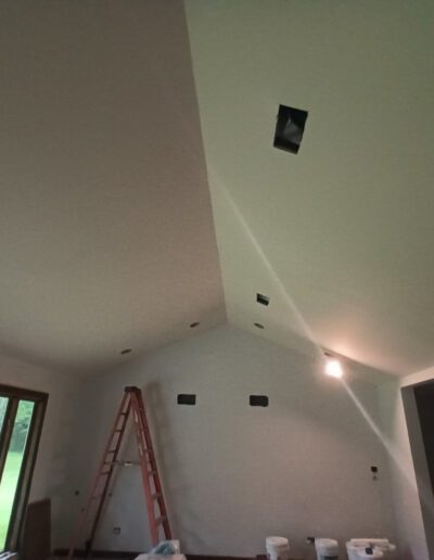 A room with a ceiling that is being remodeled.