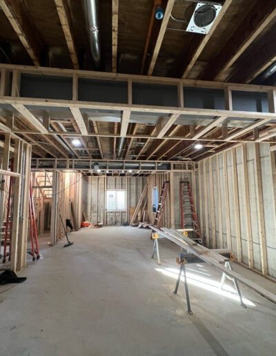 A room with wood framing under construction.